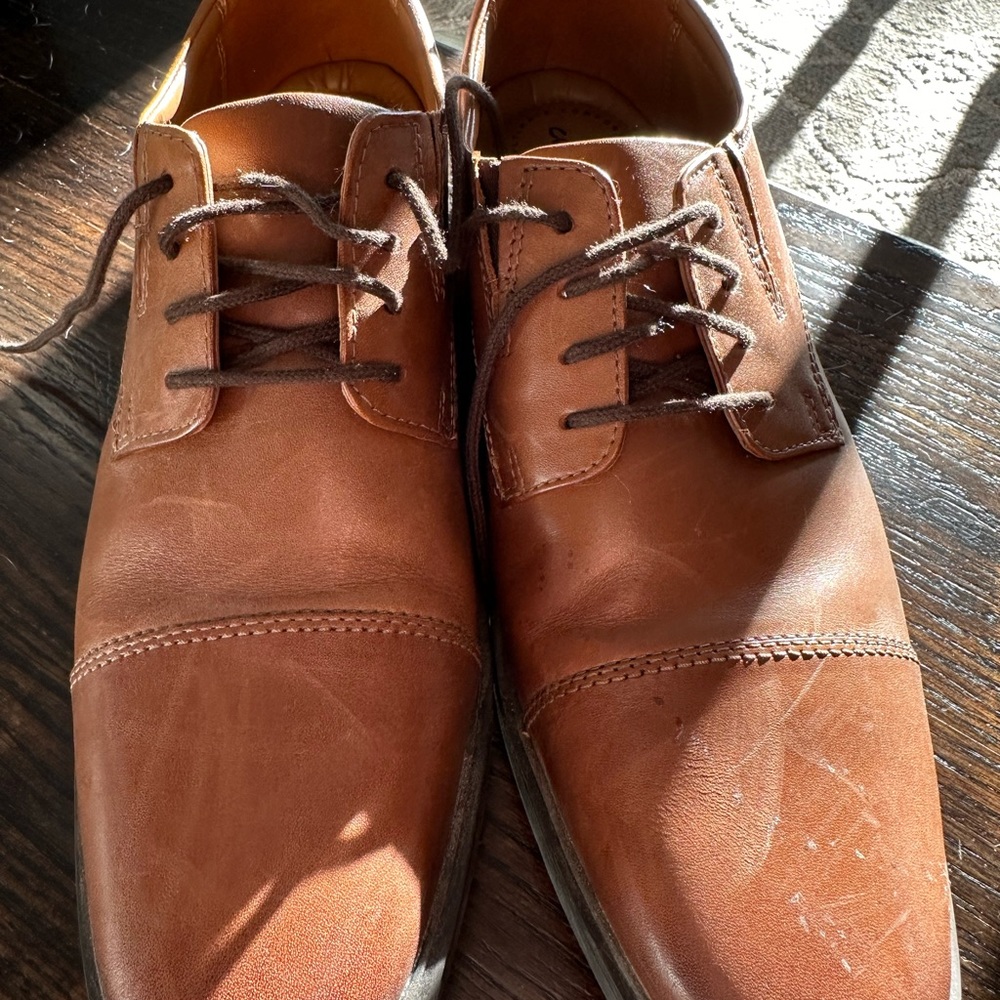 Clark’s men’s leather tan tie shoes! Size 8 (M). Worn twice. Make me an offer!